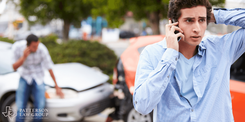 a person talking on a cell phone after a car accident